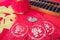 Red envelopes and traditional abacus and red lanterns and coins on red spring couplets background. The Chinese character on the re