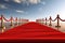 Red event carpet with rope barrier. Concept of success and triumph. Generative AI