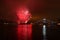 Red expolsion Fireworks Over Water San Diego, California Midway