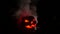 Red eye pumpking in Halloween horror scene