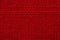 Red fabric of cloth texture background. Detail of textile material close-up