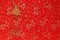Red fabric with dragon pattern with red copy space for text and golden female hairpin. Concept of Chinese New year and wedding
