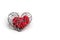 Red fabric heart in knitted wire cage