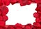 Red fabric rose petals border with white card over red background top view from above - marriage, love, wedding or valentine`s da