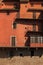 Red facade of the old houses