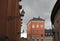 Red facade of palace w windows, Stockholm Sweden