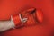 red faded boxing gloves on red background