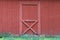 Red farm barn double door grass path