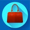 Red fashion women hand bag icon. Flat design style.