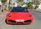 Red Ferrari F 430 parked in front of Havana restaurant at Marina Agadir