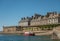 Red ferry in front of Bastion Saint Philippe, St. Malo, France