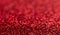 Red festive Christmas background. Abstract shimmering bright background with bokeh defocused