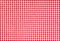 Red firebrick gingham pattern texture background.