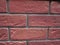 red fired brick wall surface