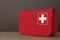 Red First Aid Kit Soft Bag with White Cross. 3d Rendering