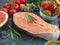 Red fish on concrete gourmet board fresh background dinner preparation, sea, cold