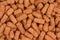 Red fish feed pellets for background