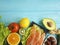 Red fish omega 3 , fresh avocado nuts assortment on blue wooden, composition healthy food