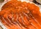 Red fish salmon sliced into thin slices