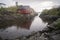 Red fishermen cabin in a fishing village of Lofoten islands, Norway