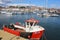 Red fishing boat in Anstruther harbour, Scotland