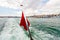 Red flag closeup in the stern boat. Bosphorus, Istanbul.