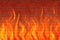 Red flame of fire on brickwall backgrounds