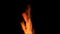 Red flame in front of black background