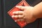 red flammable symbol of chemical and children hand
