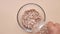 red Flattened rice in a bowl on color background