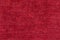 red fleecy background. shaggy fiber surface. fine grain felt red fabric. texture polyester close-up