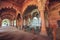 Red Fort Delhi medieval red sandstone hallway with marble throne of the emperor at Delhi, India