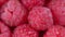 Red fresh raspberries fruit. Juicy healthy berry for healthy diet. Macro shot.