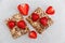 Red Fresh Strawberries are on the Cracker with Grains on the White Paper.Breakfast Organic Healthy Tasty Food.Cooking Vitamins