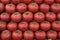 Red fresh tomatoes background. Group of tomatoes