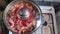 red fresh vegetable borscht soup on plate, homemade food