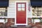 Red front door of an american home