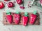 Red fruits popsicle ice . Homemade ice cream on light green table background, top view. Healthy summer desserts. Frozen juices on