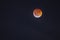 Red full Moon eclipse from Santiago de Chile city, a view from the southern hemisphere of this amazing astronomical event of the E