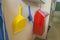Red garbage and yellow dustpan