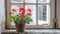 Red geranium flowers in terracotta pots on a rustic window ledge