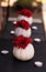 Red gerbera daisies in carved white Casper pumpkins