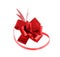 Red gift bow isolated on white background. It can be used for wrapping Christmas and birthday gifts
