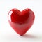 Red glass heart on white background, romanticism, glass heart sculpture