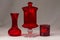 a red glass trio collected over the years