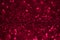 Red glitter magic background. Defocused light and free focused place for your design.