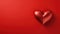 Red glossy Heart Shape on red background. Valentines day background.