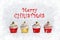 Red and gold Christmas cupcakes on white background