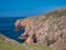 Red granite cliffs on Muckle Roe, Shetland, UK