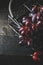 Red grape in metallic basket on black wooden background , dark mood
